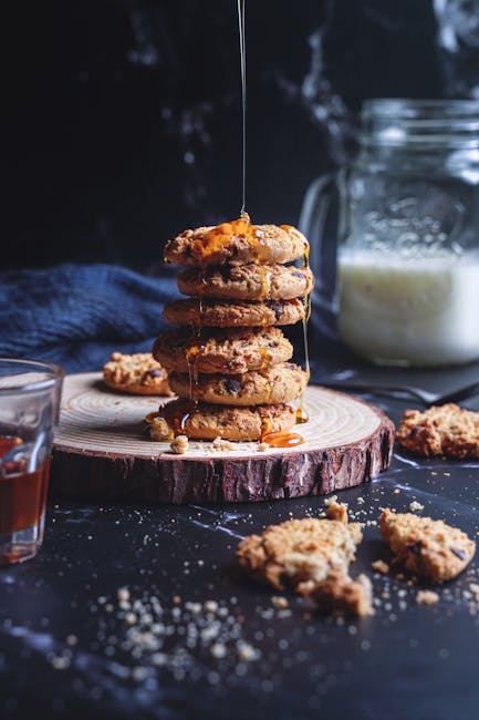 Food Aesthetics - A stack of cookies with honey dripping, creating #10311439