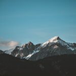 Mountain Landscapes - Stunning view of snow-capped mountains against a #1054218