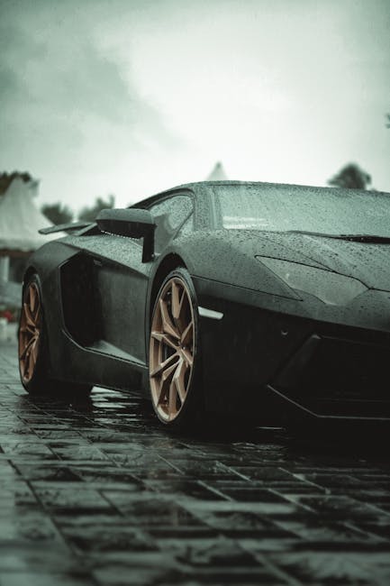Luxury Cars - Close-up of a Lamborghini Aventador parked on a  #10584720