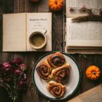 Food Aesthetics - Cozy autumn setup with coffee, books, cinnamon r #11126282
