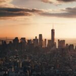 City Architecture - Captivating view of New York City skyline at sun #13275017