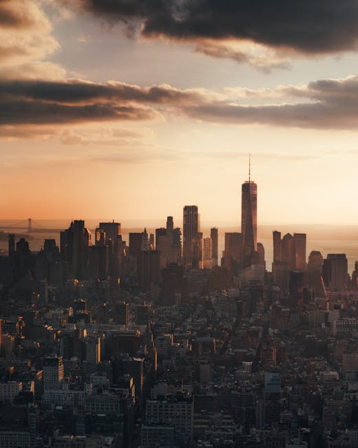 City Architecture - Captivating view of New York City skyline at sun #13275017