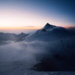 Mountain Landscapes - Breathtaking view of a snowcapped mountain peak  #13449836