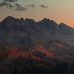 Mountain Landscapes - Dramatic landscape of mountain peaks during sunr #13715366