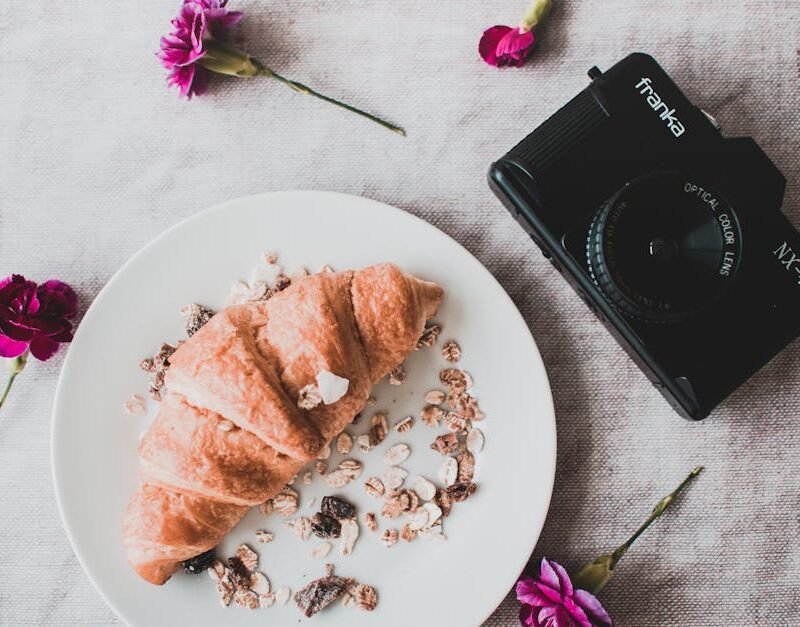 Food Aesthetics - Flat lay of a delicious croissant with a vintage #1393399