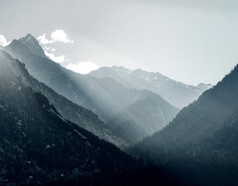 Mountain Landscapes - Breathtaking view of sunrays piercing through th #14265677