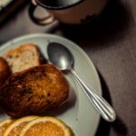 Food Aesthetics - Close-up of breakfast plate with toast and orang #14792341