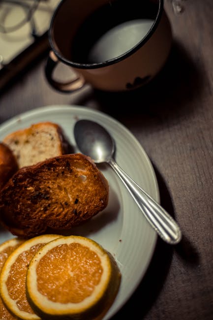 Food Aesthetics - Close-up of breakfast plate with toast and orang #14792341