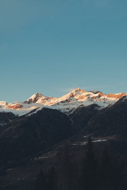 Mountain Landscapes - Beautiful sunset over snow capped Dolomites in T #15021365