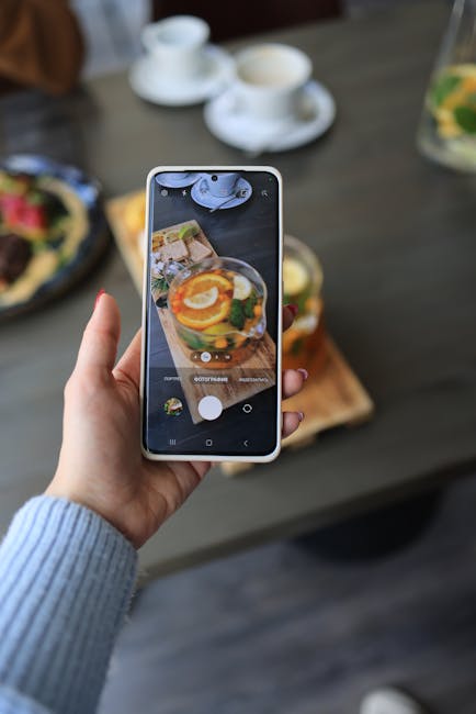 Food Aesthetics - Close-up of smartphone photographing a citrus dr #16134588