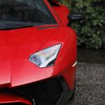 Luxury Cars - Captivating close-up of a luxury red sports car  #16584993