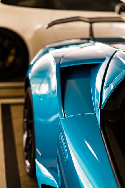 Luxury Cars - Detailed close-up of a blue supercar with a spoi #17145731