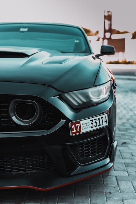 Luxury Cars - Dynamic front view of a sleek black sports car i #23507113