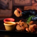Food Aesthetics - Close-up shot of fried shrimp with sauces served #25672049
