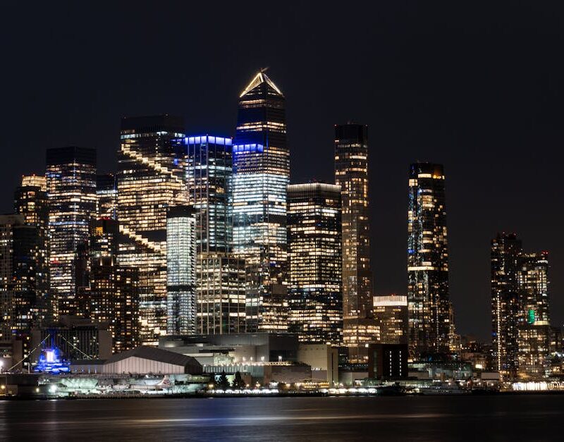 City Architecture - Vibrant New York City skyline illuminated agains #29410970