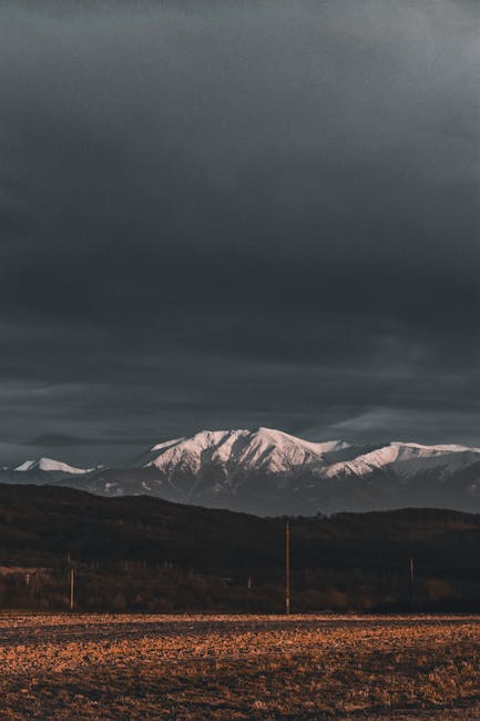 Mountain Landscapes - A breathtaking view of snow-capped mountains und #31112744