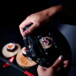 Food Aesthetics - Close-up of a photographer taking pictures of go #31286781