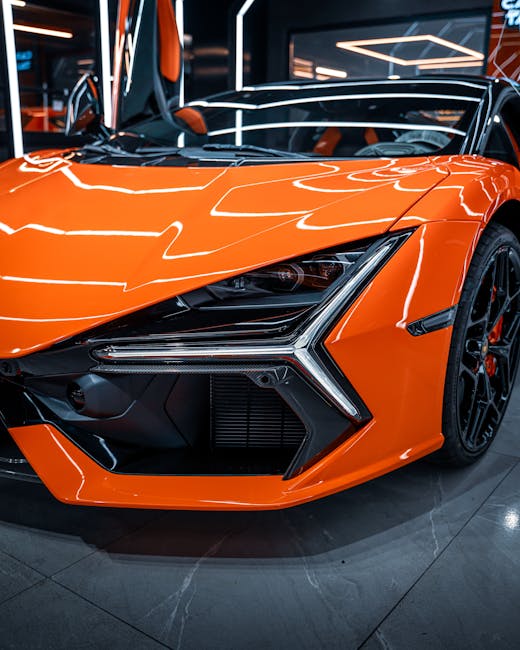 Luxury Cars - Vibrant orange sports car with elegant design in #34054723