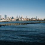 City Architecture - A distant view of Manhattan's skyline across the #35015590