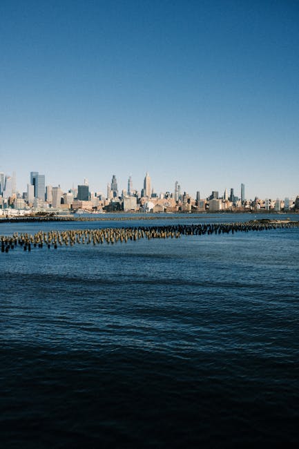 City Architecture - A distant view of Manhattan's skyline across the #35015590