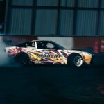 Luxury Cars - Dynamic shot of a car drifting on a racing track #35415197