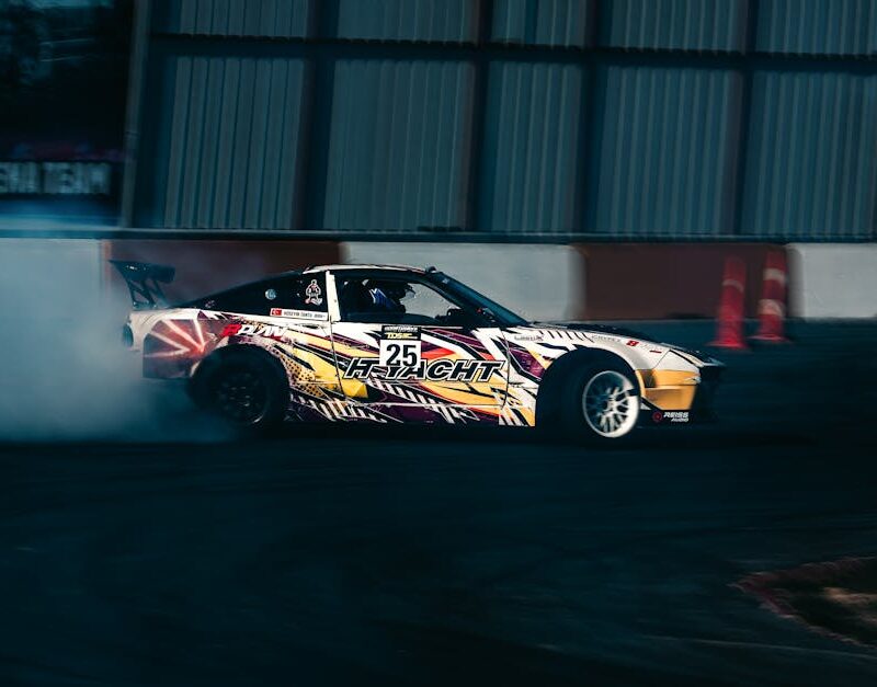 Luxury Cars - Dynamic shot of a car drifting on a racing track #35415197