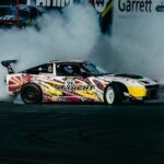 Luxury Cars - Exciting image of a colorful car performing a dr #35415234