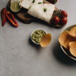 Food Aesthetics - Appetizing Mexican dish with tortilla wraps, gua #6400023