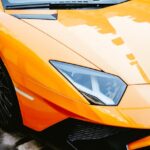 Luxury Cars - Close-up view of an orange Lamborghini Aventador #9322195